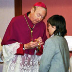 Bishop Charles Henderson presented the Benemerenti Medal to Lisa Banks at Mass on 4th February 2006
